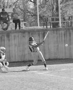New Lima Falconette Aubrey Washington knocks one out to the infield. Staff Photo by Bill Anderson